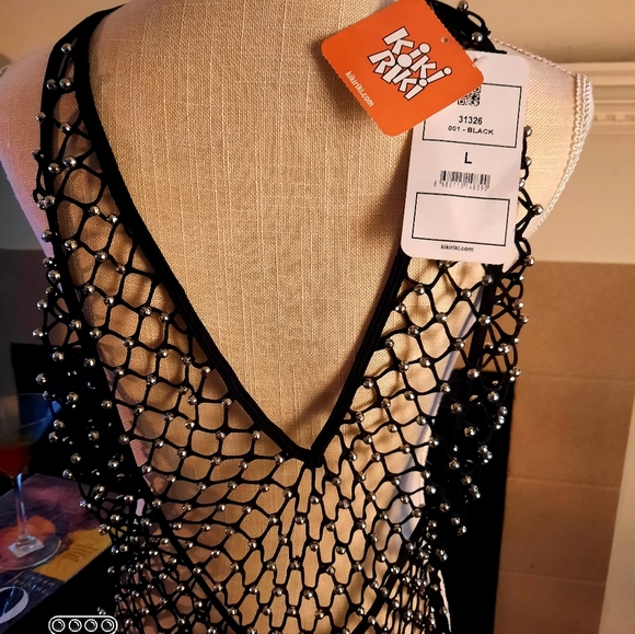 🩷NEW!⭐️ Fishnet gorgeous halter jumpsuit with grommets and stretch♥️ - Picture 3 of 6